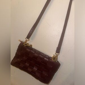 Purse with gold accents.